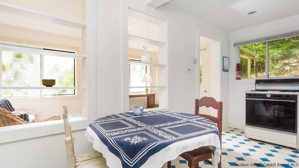 286 Rochester Center Road Kerhonkson, NY 12446 - Photo 31 of 34 a bedroom with a bed and a television