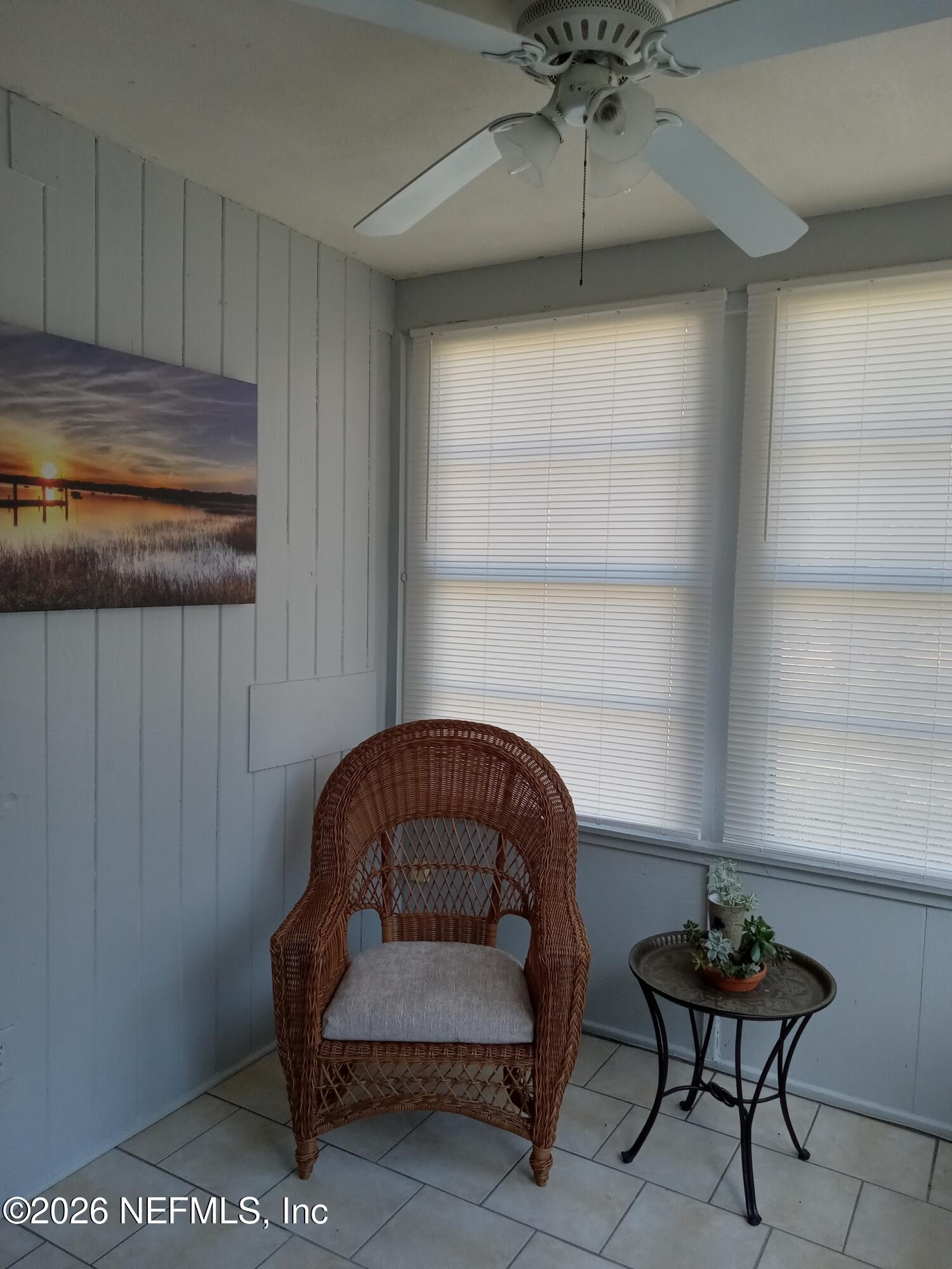 5527 Graywood Road Jacksonville, FL 32207 - Photo 11 of 12 a living room with furniture and a potted plant