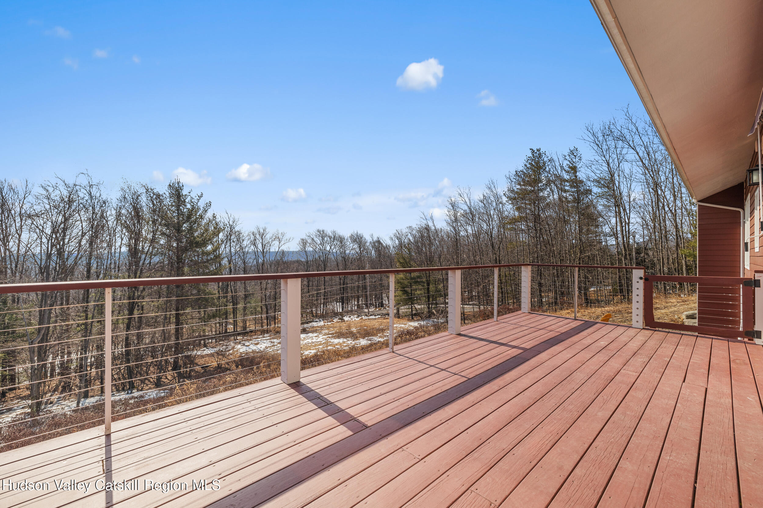 184 Haver Road Olivebridge, NY 12461 - Photo 25 of 31 a view of roof deck with wooden floor and fence with a floor to ceiling window