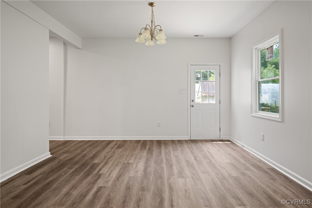 9214 River Road Petersburg, VA 23803 - Photo 14 of 36 Unfurnished dining area with wood finished floors