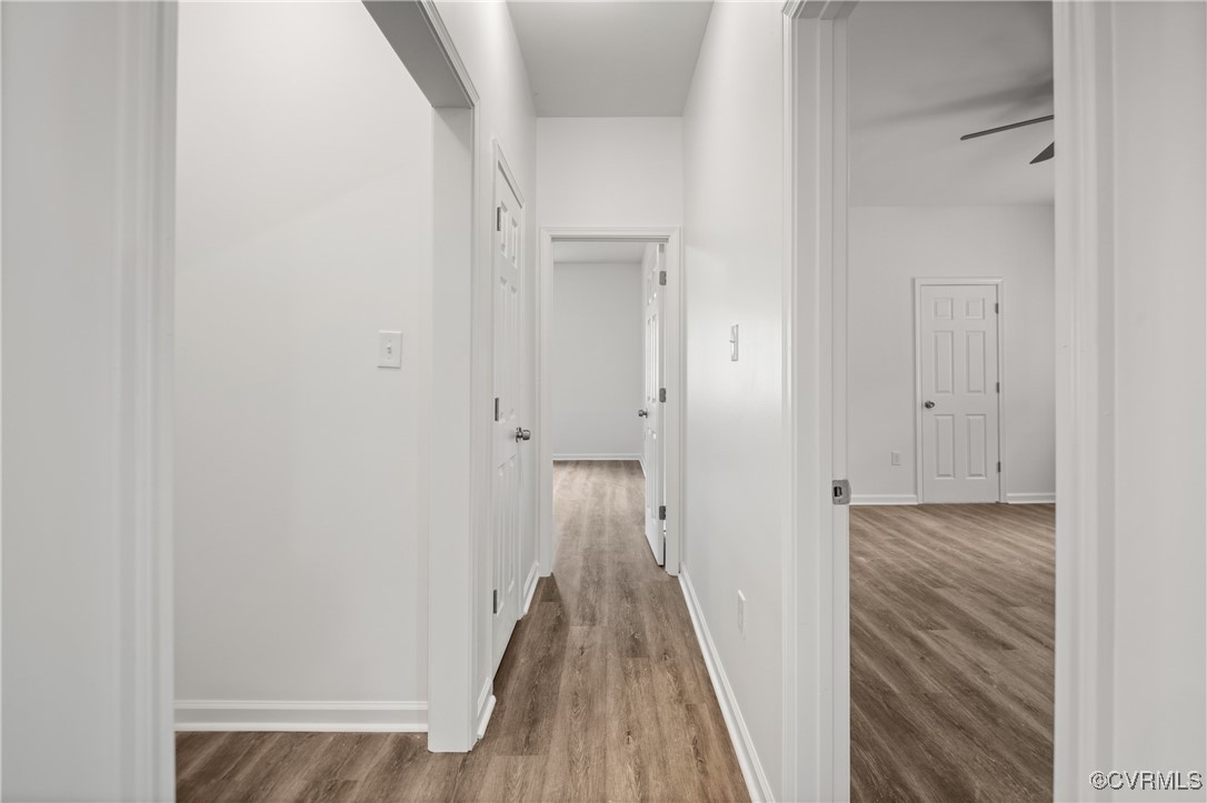 9214 River Road Petersburg, VA 23803 - Photo 23 of 36 Hallway with wood finished floors and baseboards