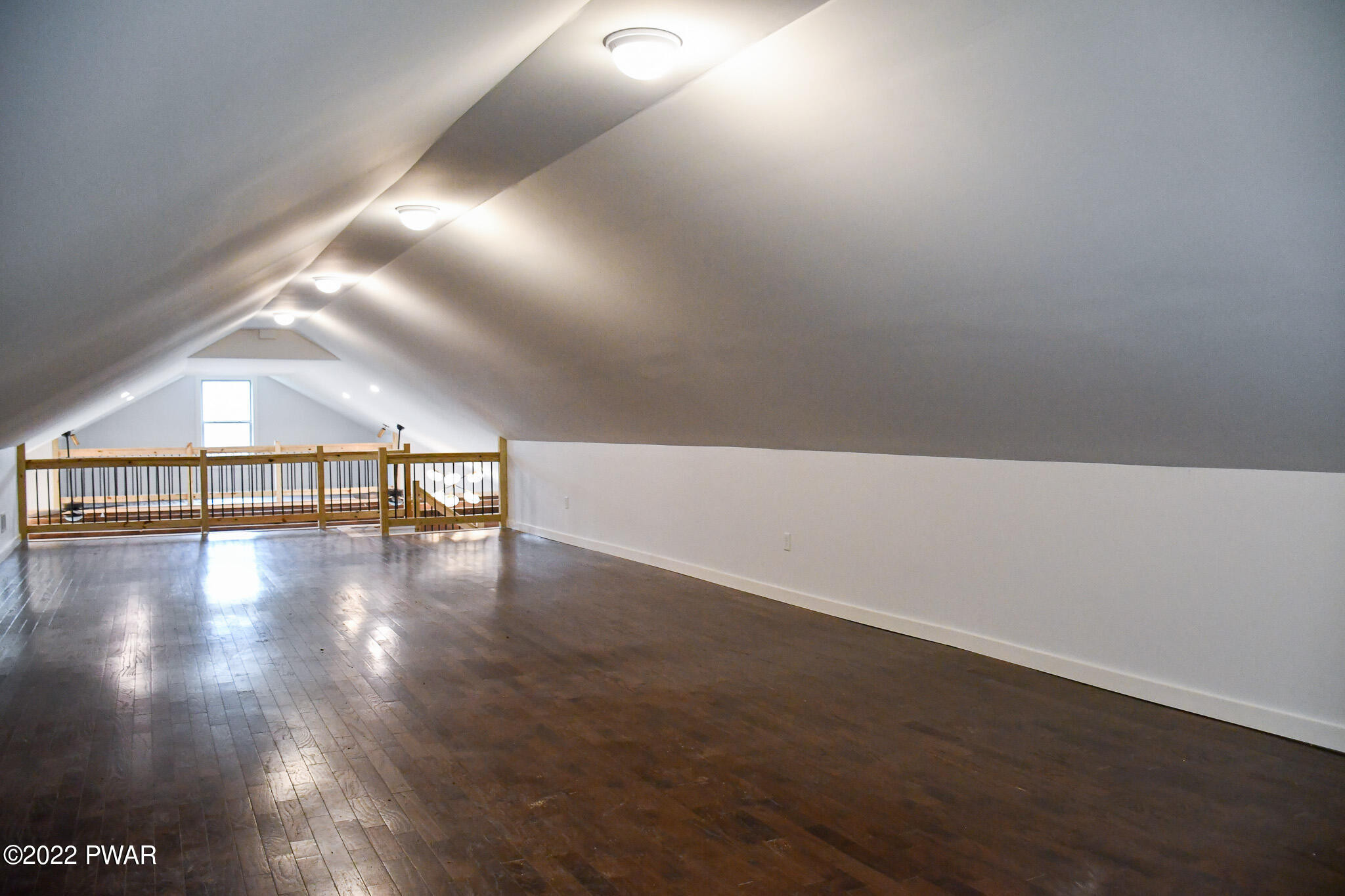 2 Hudson Street Hawley, PA 18428 - Photo 23 of 43 a view of an empty room with wooden floor