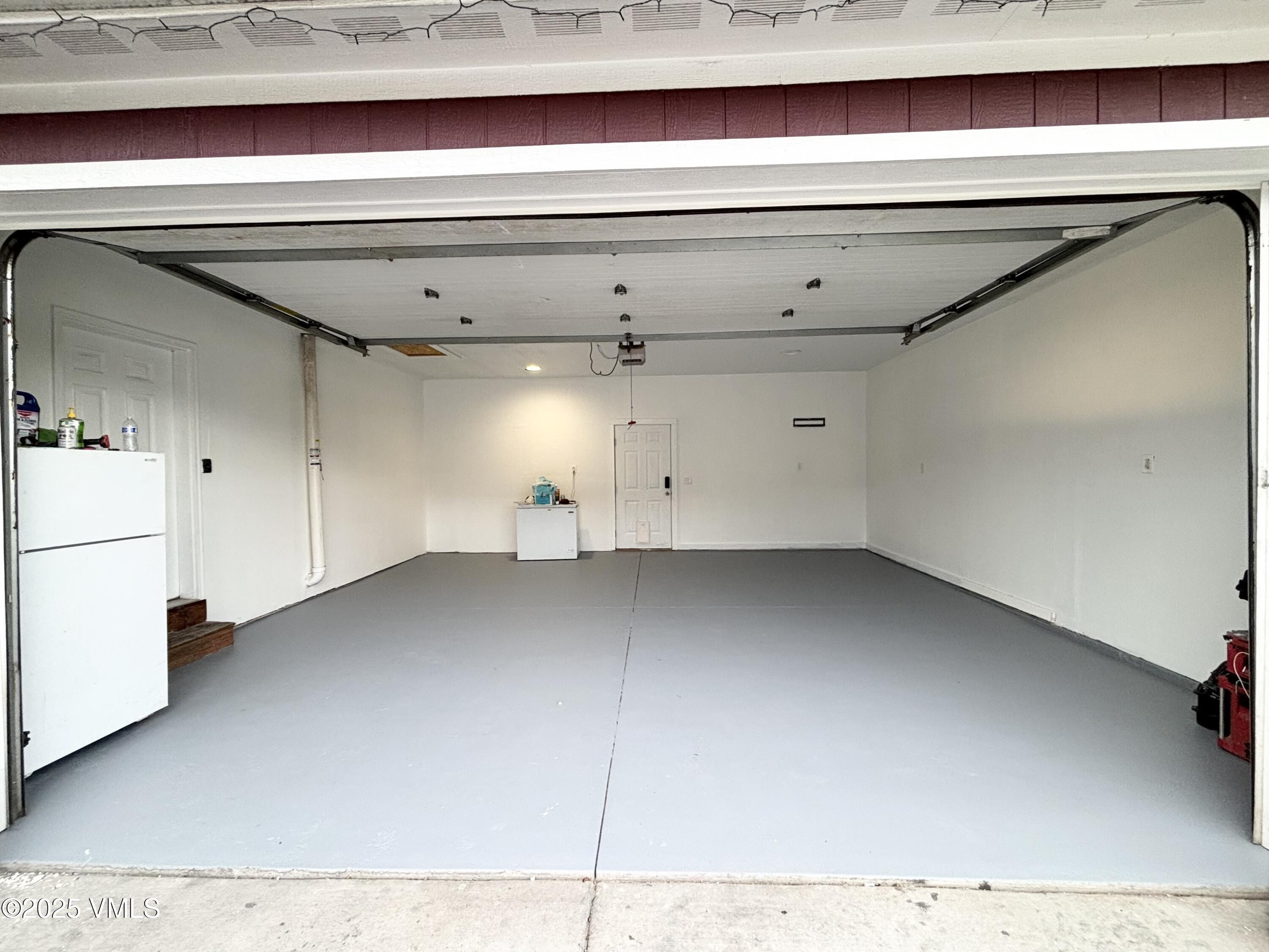 66 Bluegill Loop Gypsum, CO 81637 - Photo 30 of 37 a view of storage and utility room with washer and dryer