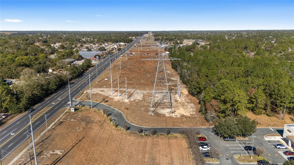 Maricamp Road Belleview, FL 34420 - Photo 3 of 8 an aerial view of residential houses with outdoor space