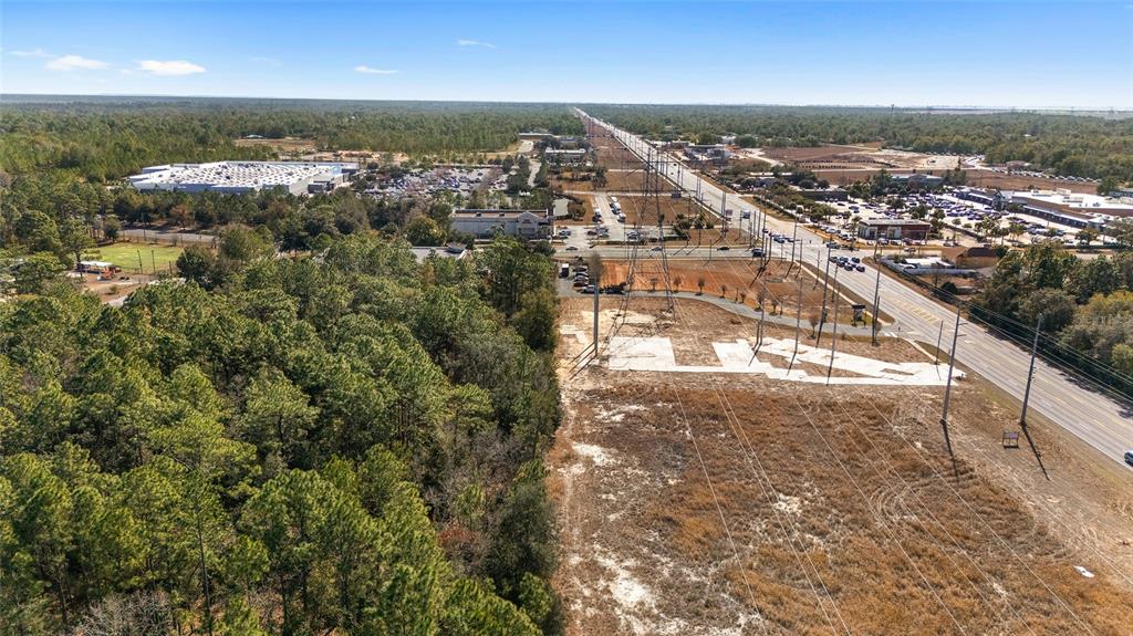Maricamp Road Belleview, FL 34420 - Photo 8 of 8 an aerial view of residential building with parking space