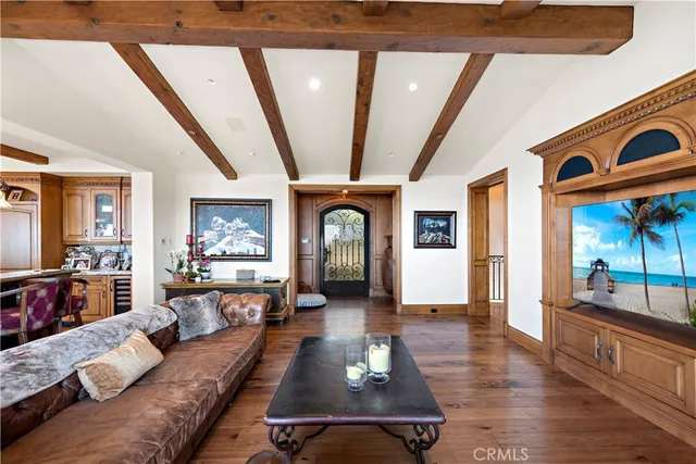 a kitchen with stainless steel appliances granite countertop a sink stove and wooden cabinets