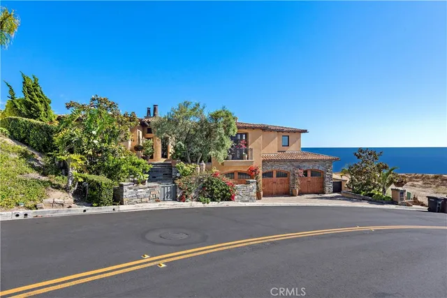 front view of a house with a street view