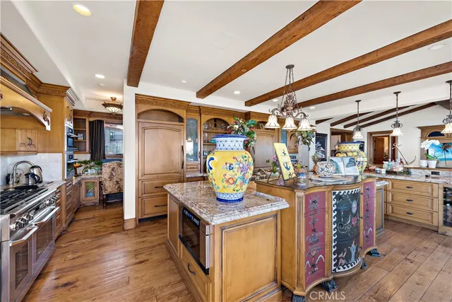 a bedroom with a bed couch and a ceiling fan