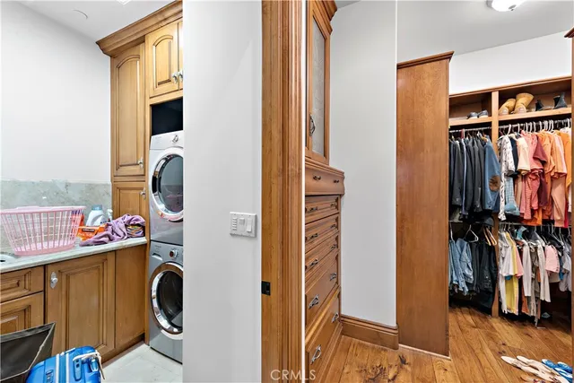a view of entryway livingroom and hall with wooden floor