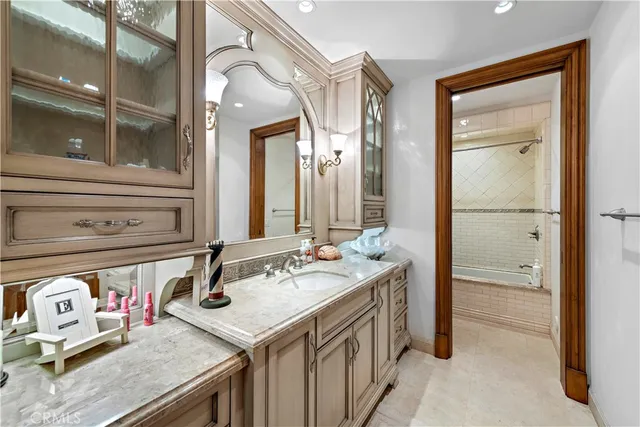 a kitchen with sink cabinets and wooden floor
