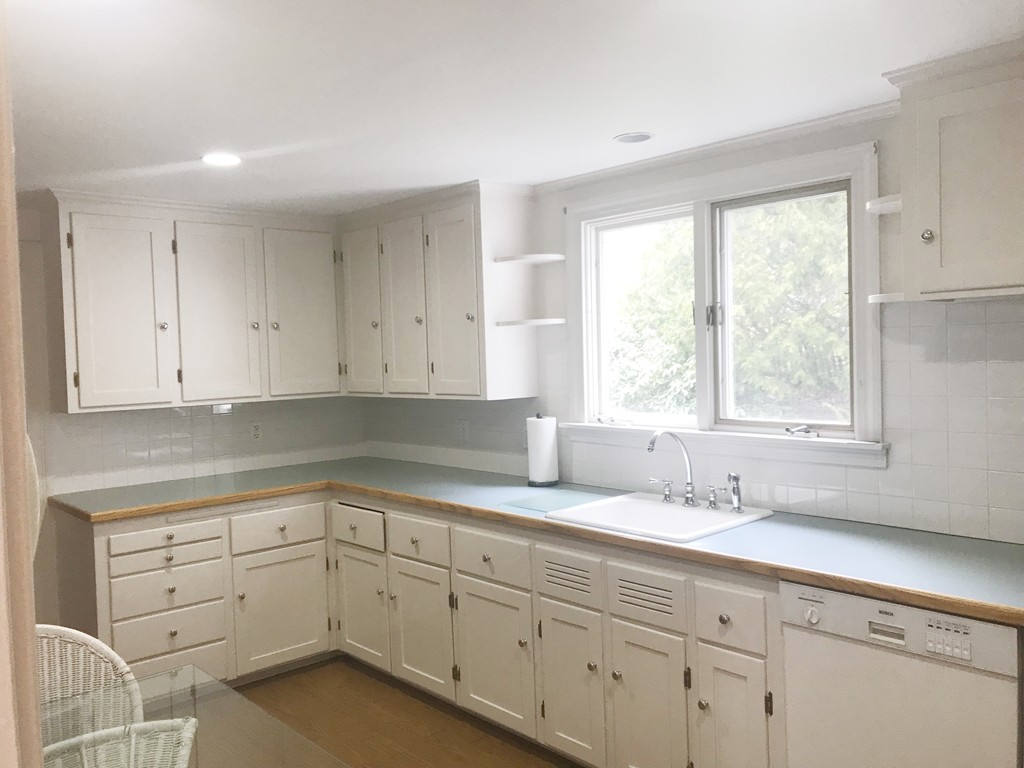 1 Longfellow Road Wellesley, MA 02481 - Photo 2 of 6 a kitchen with sink cabinets and window