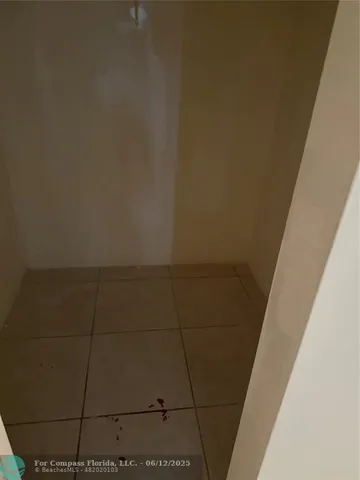 a bathroom with a sink and a shower