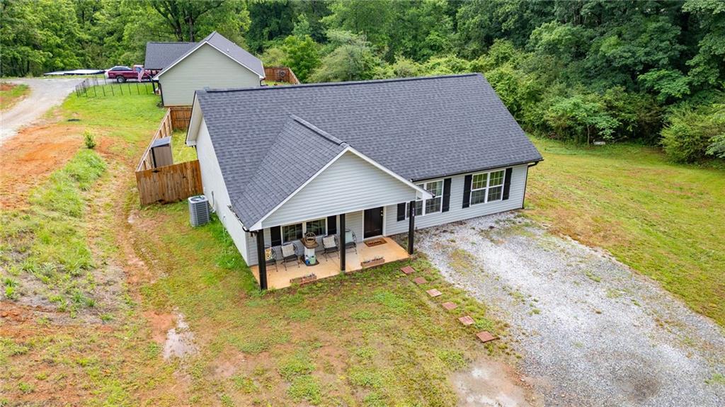 118 Wash Rider Road Dahlonega, GA 30533 - Photo 29 of 37 a aerial view of a house with swimming pool and porch