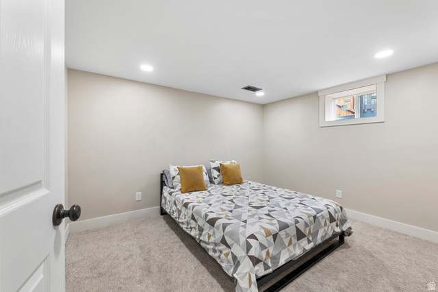 523 South Main Street Payson, UT 84651 - Photo 33 of 41 Neutral tone walls featuring recessed lighting, a white trim window, and plush carpet flooring