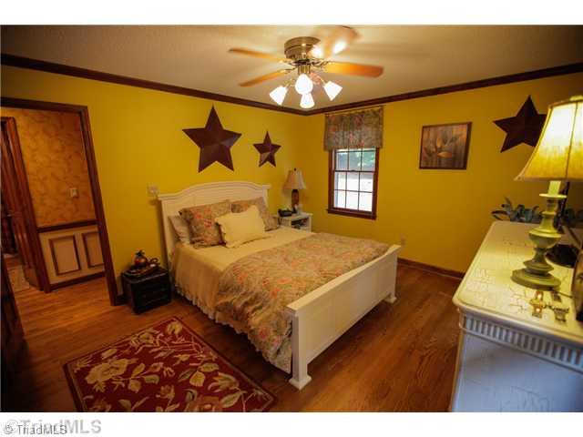 5401 Edgerunner Road Oak Ridge, NC 27310 - Photo 11 of 16 2nd Bedroom. Second bedroom is large enough for a queen size bed. Also with large closet.