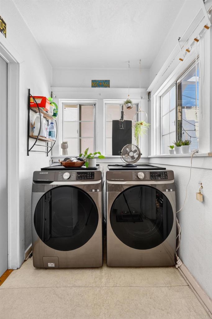1530 East Appleton Street Long Beach, CA 90802 - Photo 16 of 61 a kitchen with a sink a washer and dryer