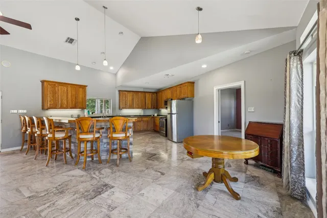 a view of a dining room with furniture
