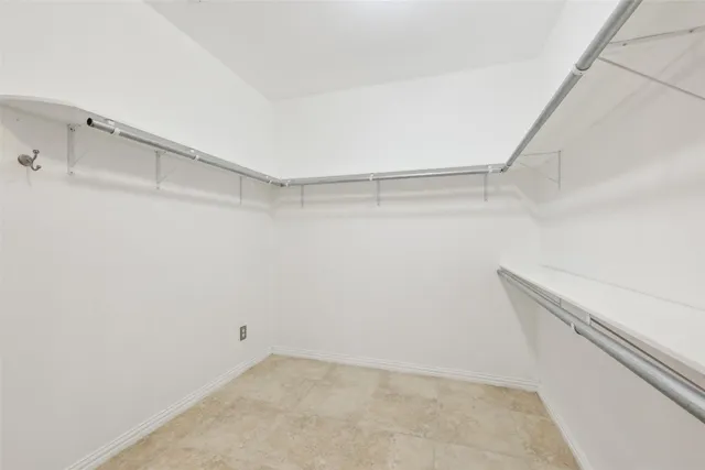 a view of an empty walk in closet