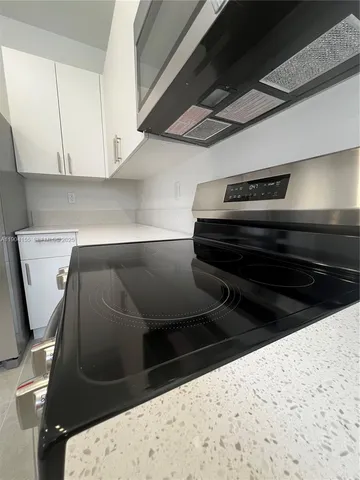 a view of a room with rack on the wall