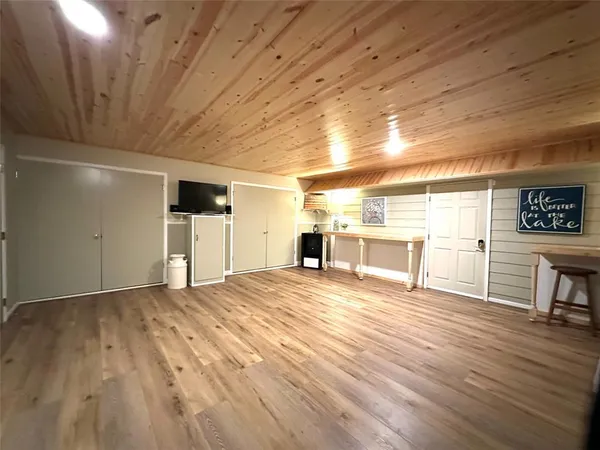a view of a livingroom with wooden floor