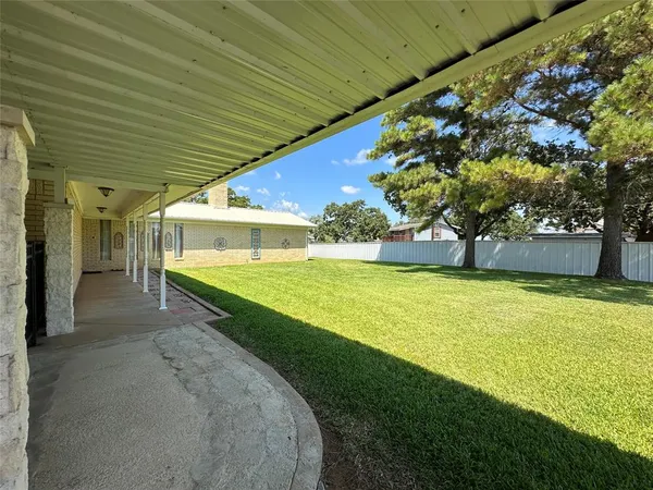 a front view of house with yard