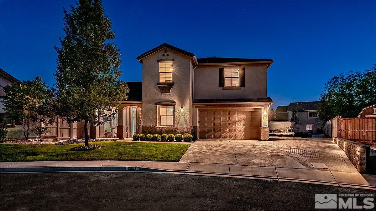 2552 Country Falls Lane Reno, NV 89521 - Photo 1 of 40 a front view of a house with a yard