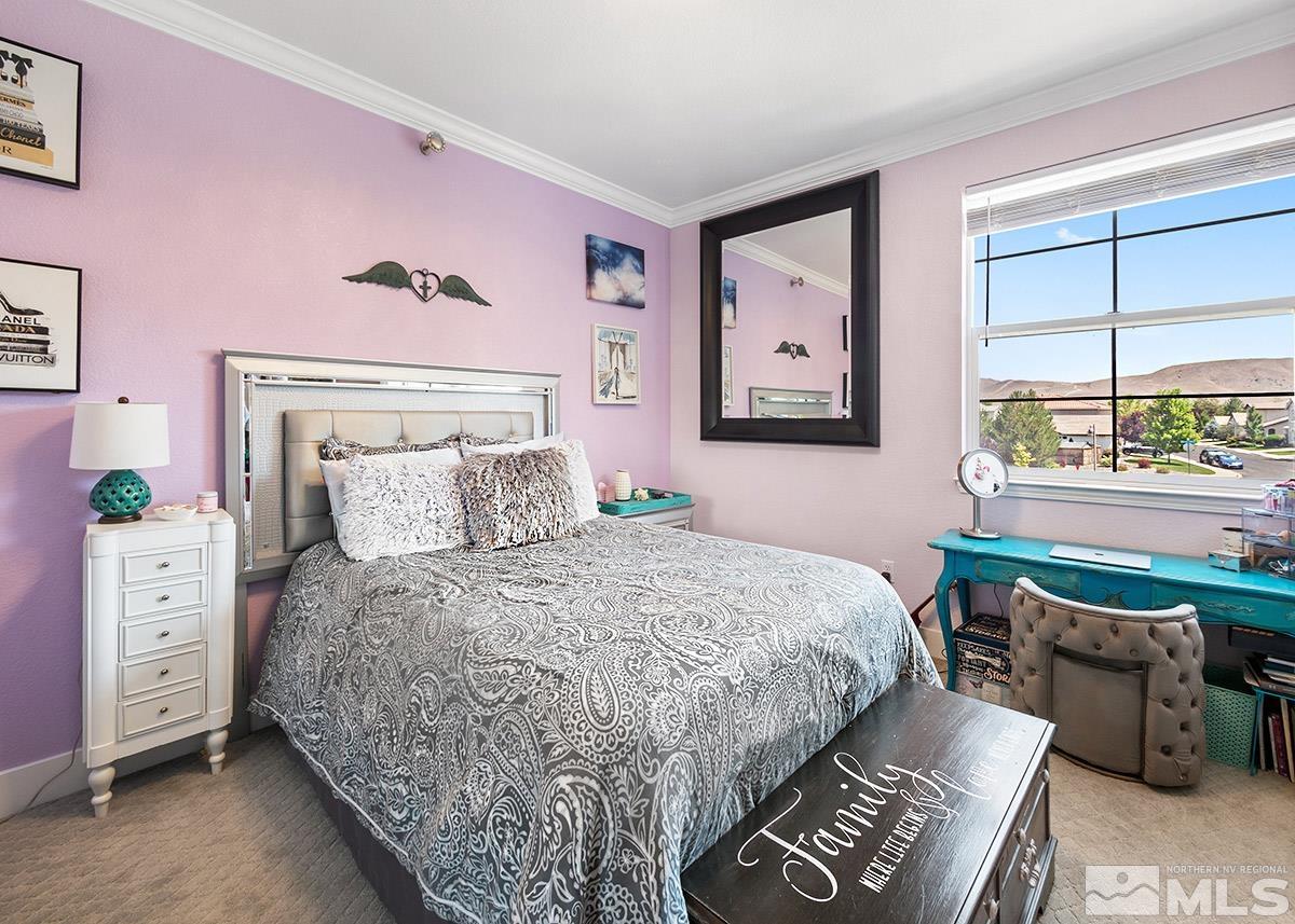 2552 Country Falls Lane Reno, NV 89521 - Photo 20 of 40 a bedroom with a bed and a window