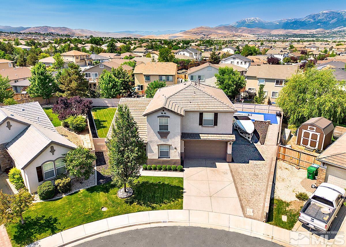 2552 Country Falls Lane Reno, NV 89521 - Photo 2 of 40 an aerial view of a house with a yard basket ball court and outdoor seating