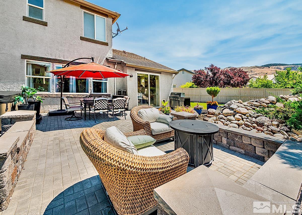 2552 Country Falls Lane Reno, NV 89521 - Photo 29 of 40 a outdoor space with patio the couches and pool view