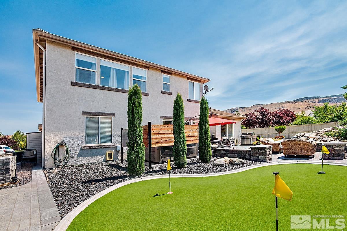 2552 Country Falls Lane Reno, NV 89521 - Photo 31 of 40 a view of a house with swimming pool and porch