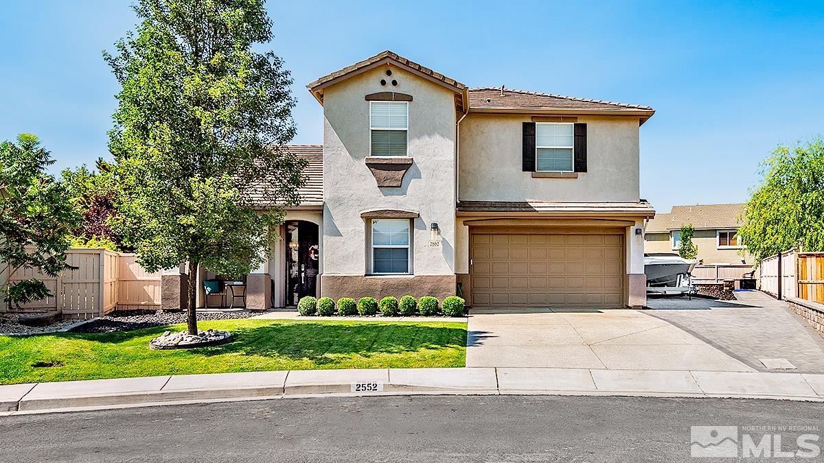 2552 Country Falls Lane Reno, NV 89521 - Photo 37 of 40 a front view of a house with a yard