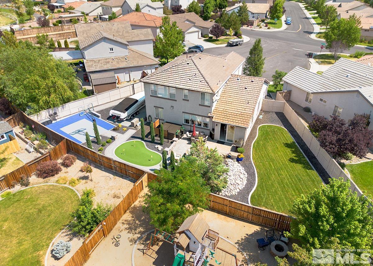 2552 Country Falls Lane Reno, NV 89521 - Photo 38 of 40 an aerial view of a house with a garden and lake view