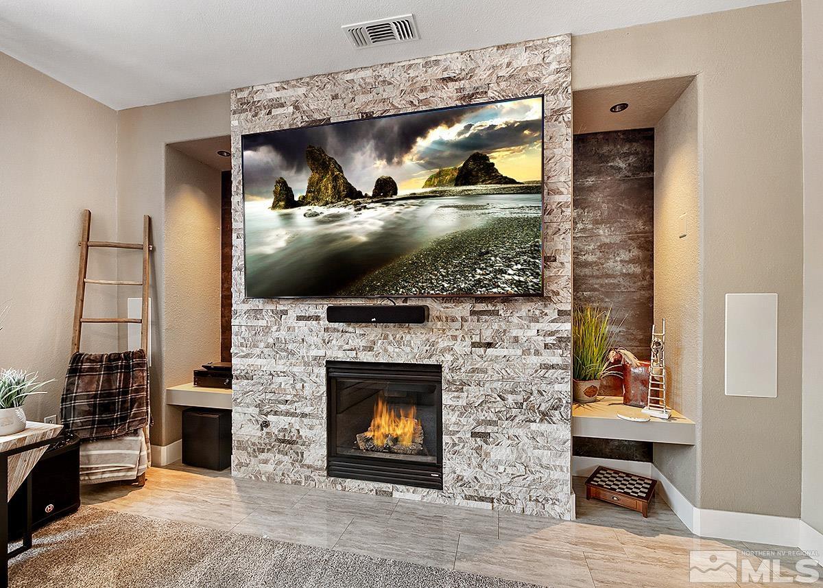 2552 Country Falls Lane Reno, NV 89521 - Photo 7 of 40 a living room with furniture and a fireplace