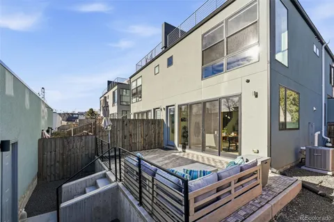 a view of a couches on the roof deck