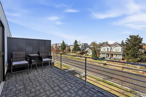 a view of a terrace with sitting area