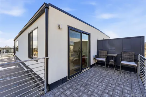 a backyard of a house with seating space