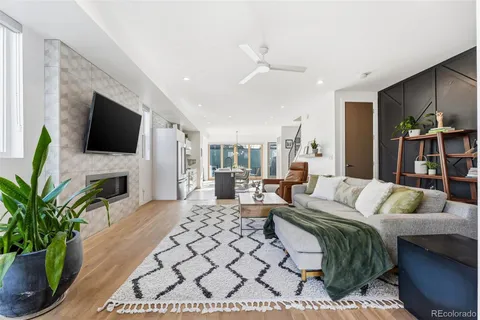 a bedroom with a large bed and a flat screen tv