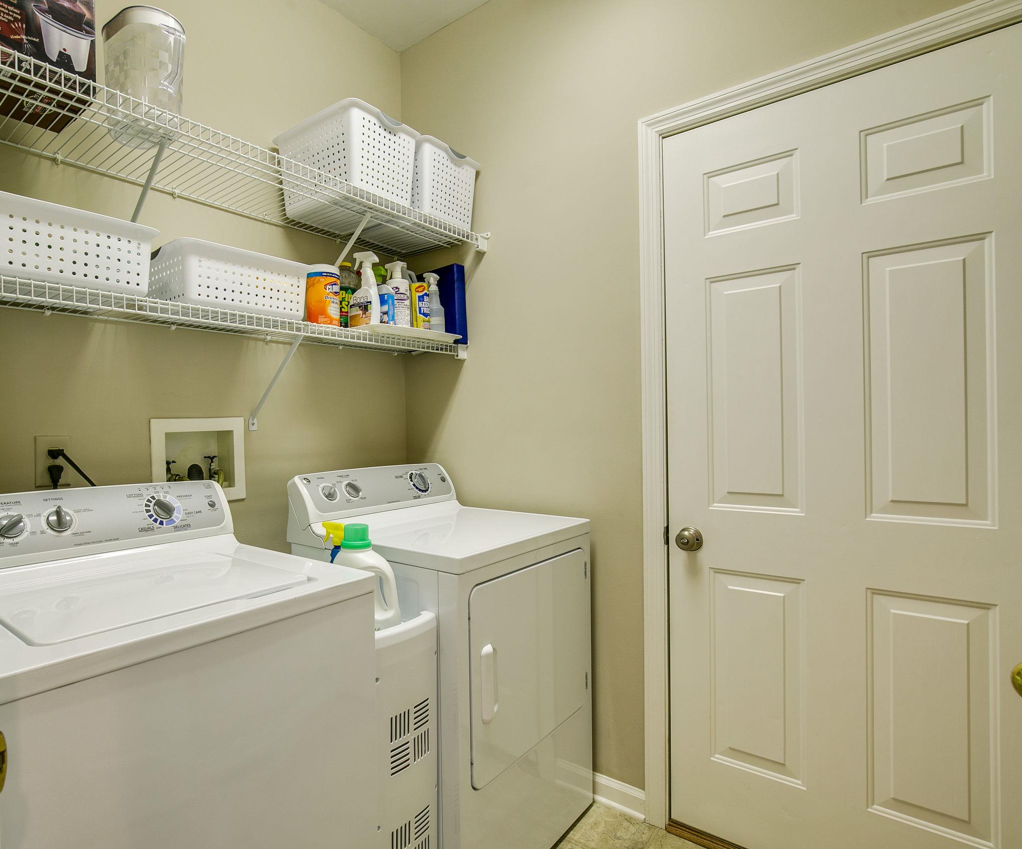114 Chester Stevens Road Franklin, TN 37067 - Photo 14 of 30 a utility room with dryer and washer