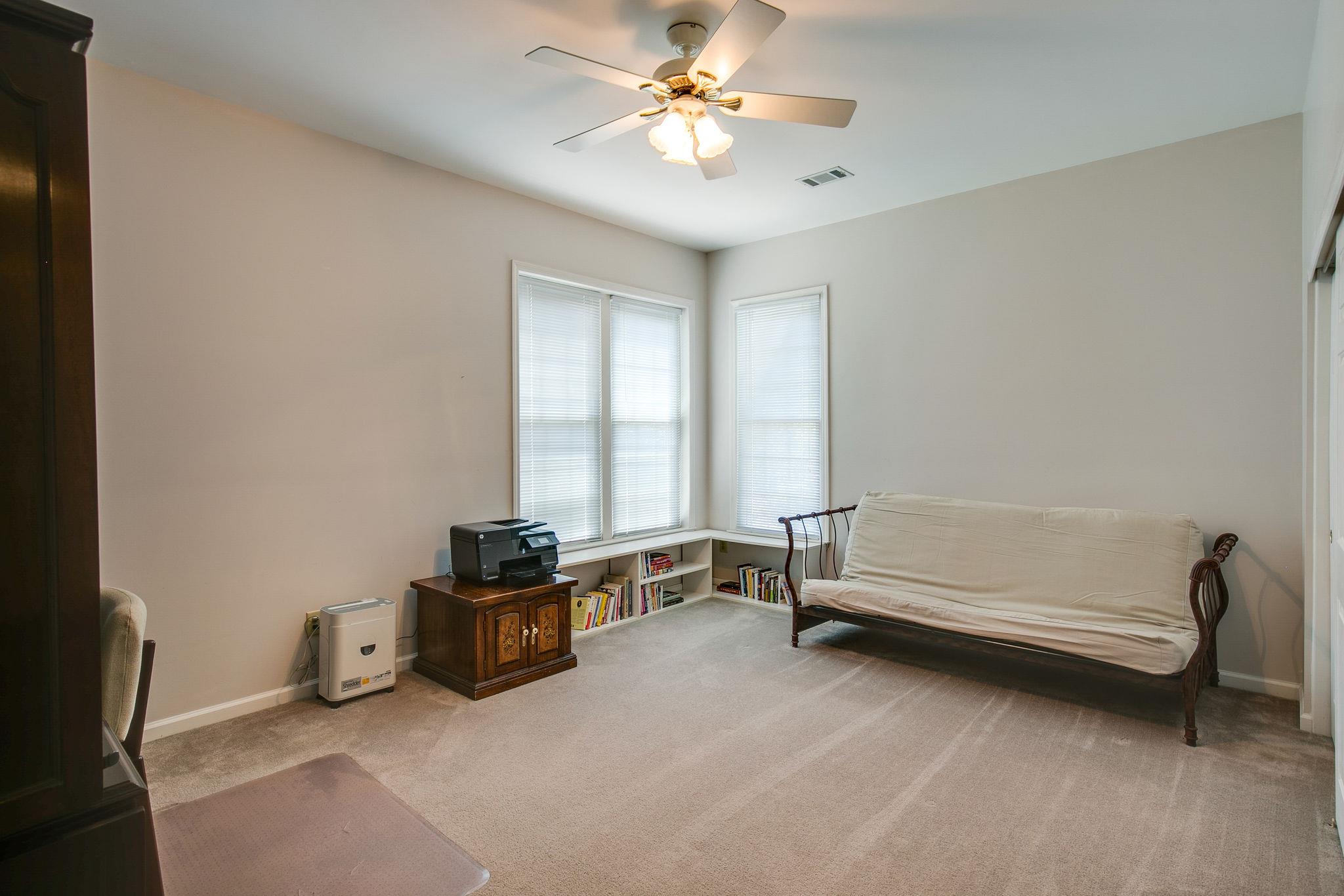 114 Chester Stevens Road Franklin, TN 37067 - Photo 25 of 30 a living room with furniture a ceiling fan and a window
