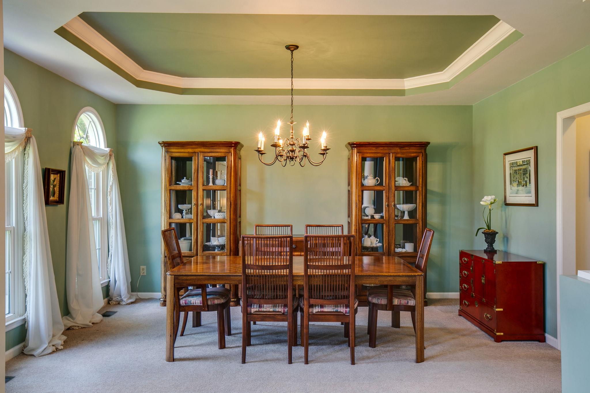 114 Chester Stevens Road Franklin, TN 37067 - Photo 5 of 30 a view of a dining room with furniture and chandelier