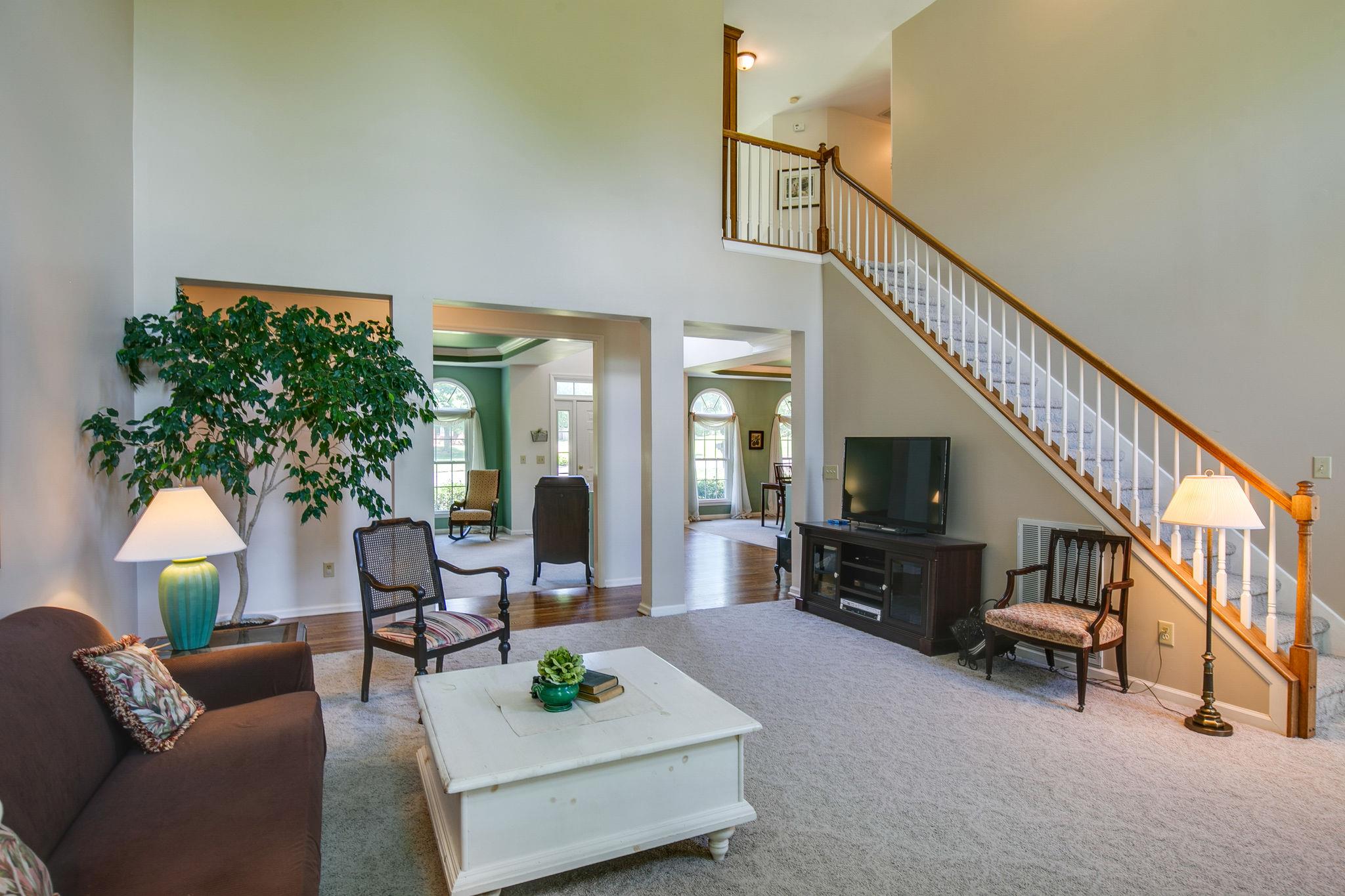114 Chester Stevens Road Franklin, TN 37067 - Photo 30 of 30 a living room with furniture and a flat screen tv