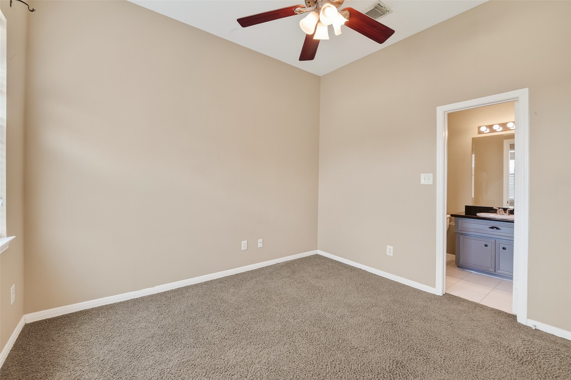 2804 Chenevert Street Houston, TX 77004 - Photo 25 of 37 an empty room with a view of a kitchen