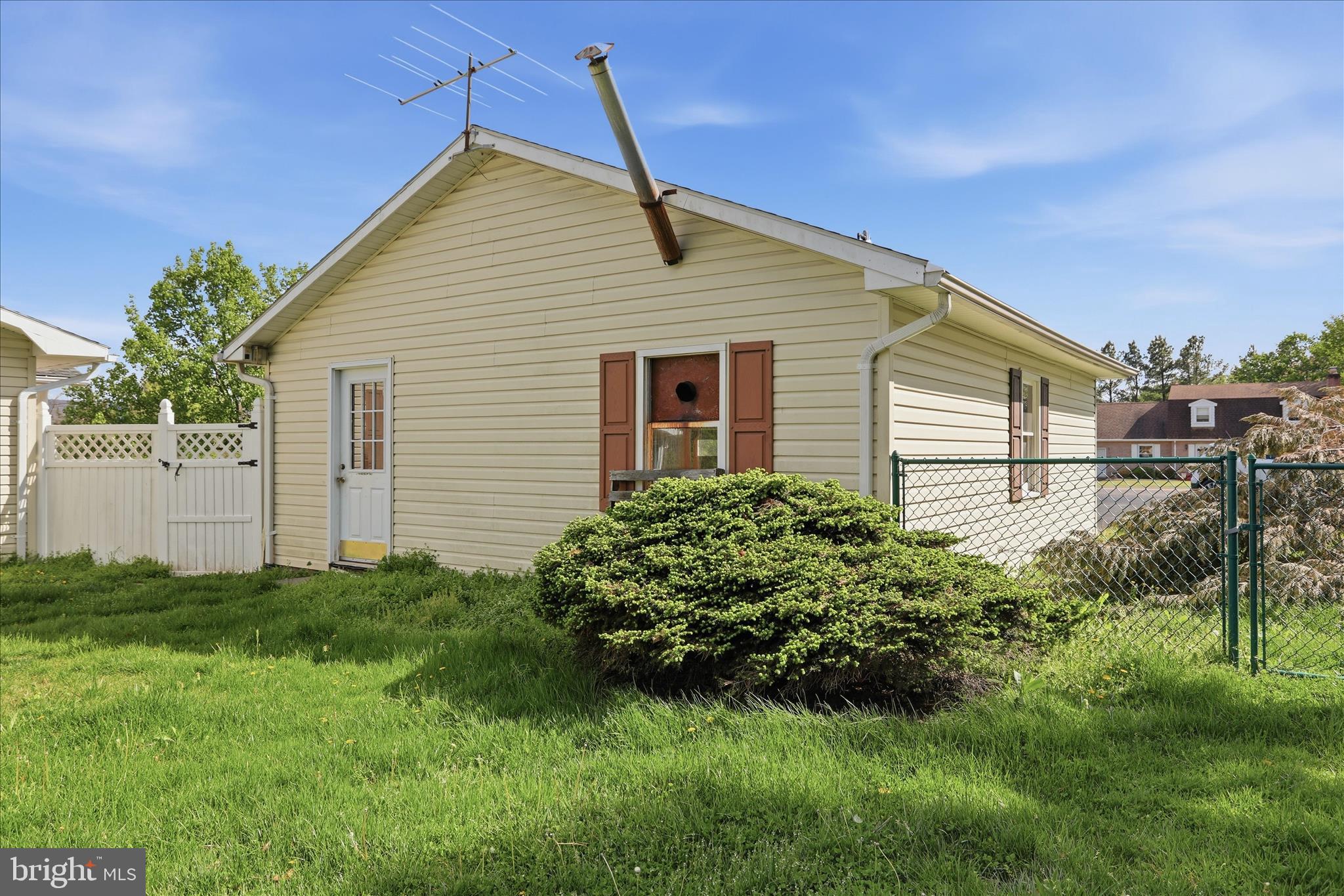 55 Highland Ridge Road Berkeley Springs, WV 25411 - Photo 36 of 44 a house view with a garden