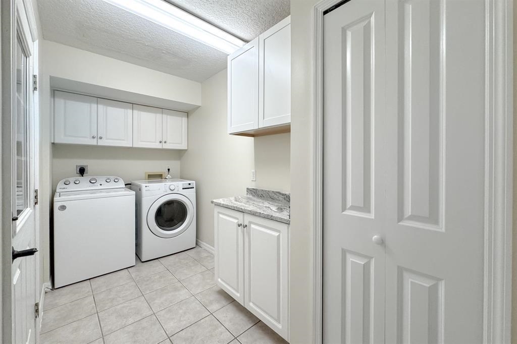 205 Shirley's Way St. Augustine, FL 32086 - Photo 18 of 56 a utility room with dryer and washer