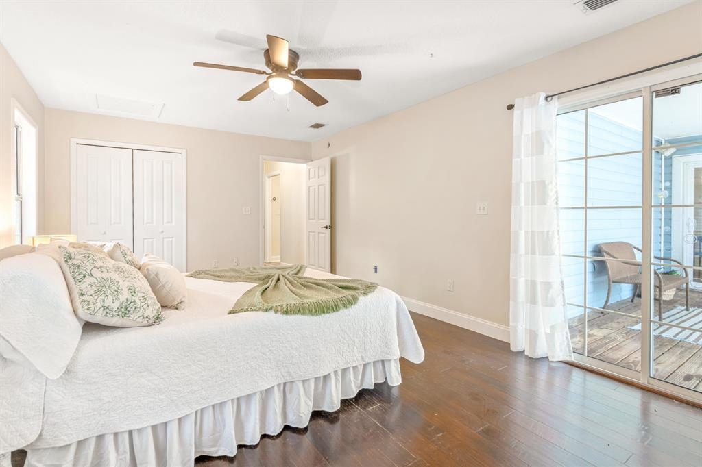 205 Shirley's Way St. Augustine, FL 32086 - Photo 31 of 56 a bedroom with a bed a window and ceiling fan