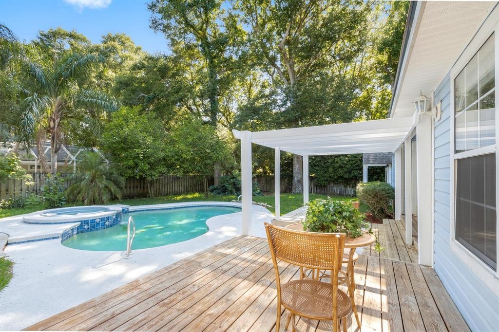 205 Shirley's Way St. Augustine, FL 32086 - Photo 35 of 56 a view of a house with backyard sitting area and garden