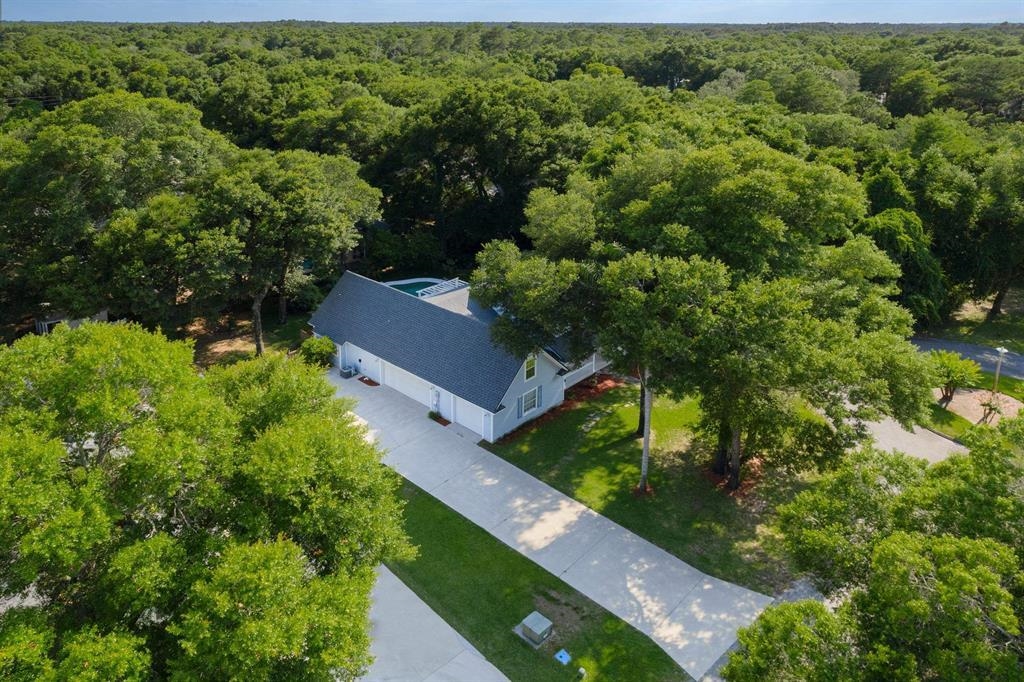 205 Shirley's Way St. Augustine, FL 32086 - Photo 54 of 56 an aerial view of a house with a yard