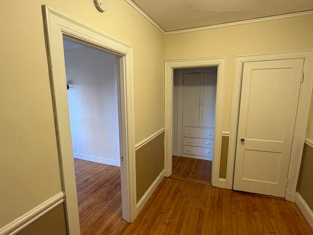 hallway with wooden floor