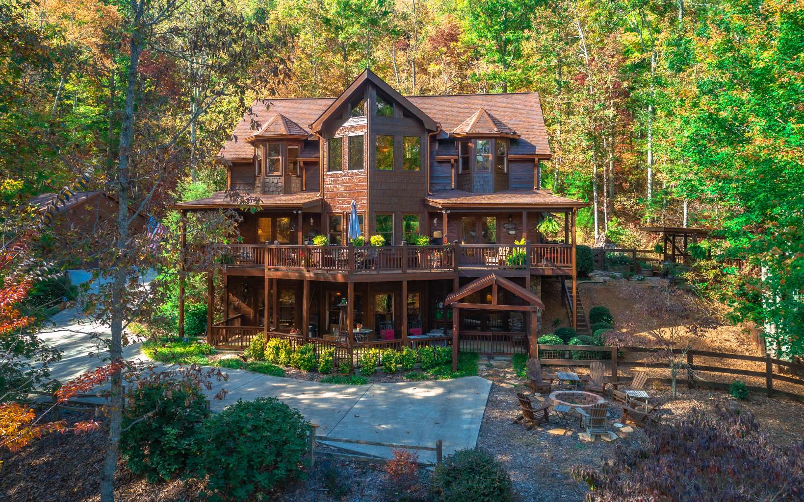 156 Overlook Drive Blue Ridge, GA 30513 - Photo 1 of 1 a front view of a house with garden