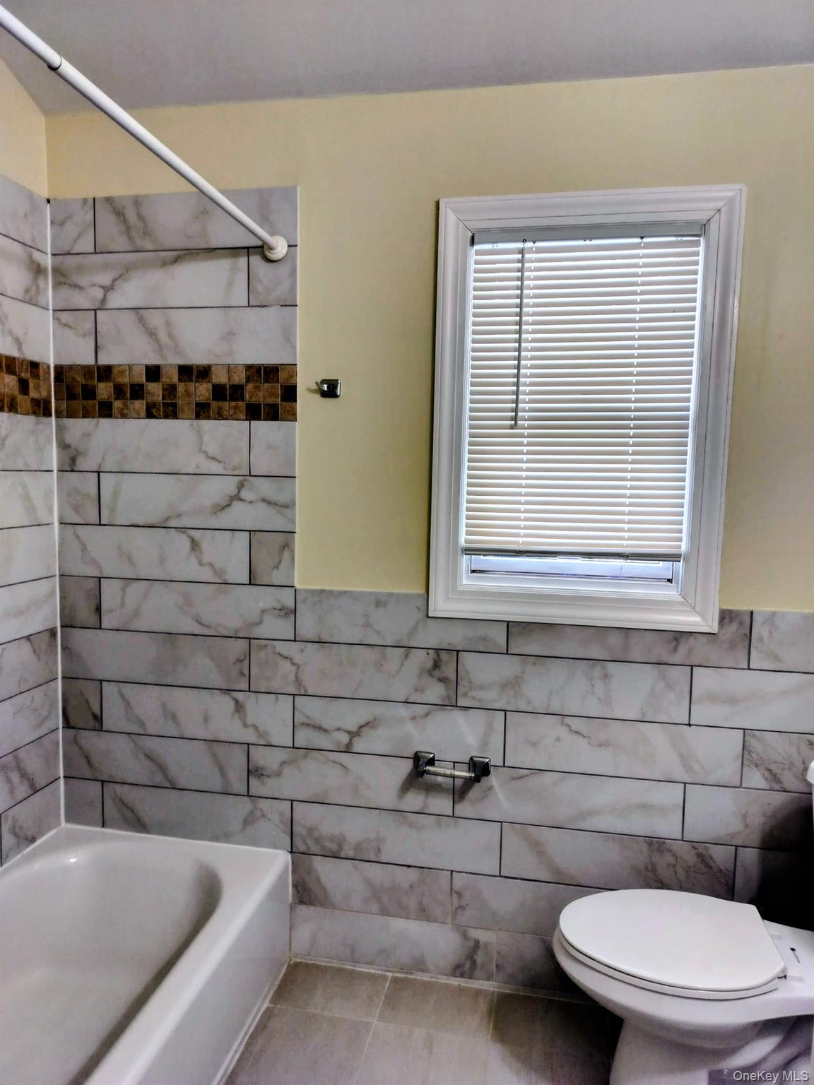 53 Juniper Road, Unit B Port Washington, NY 11050 - Photo 4 of 8 Renovated bathroom